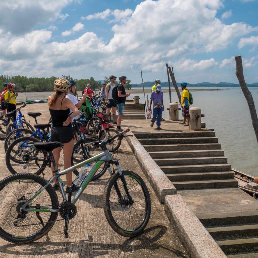 A guided bike tour goes around the Koh Yao Noi Island in Thailand