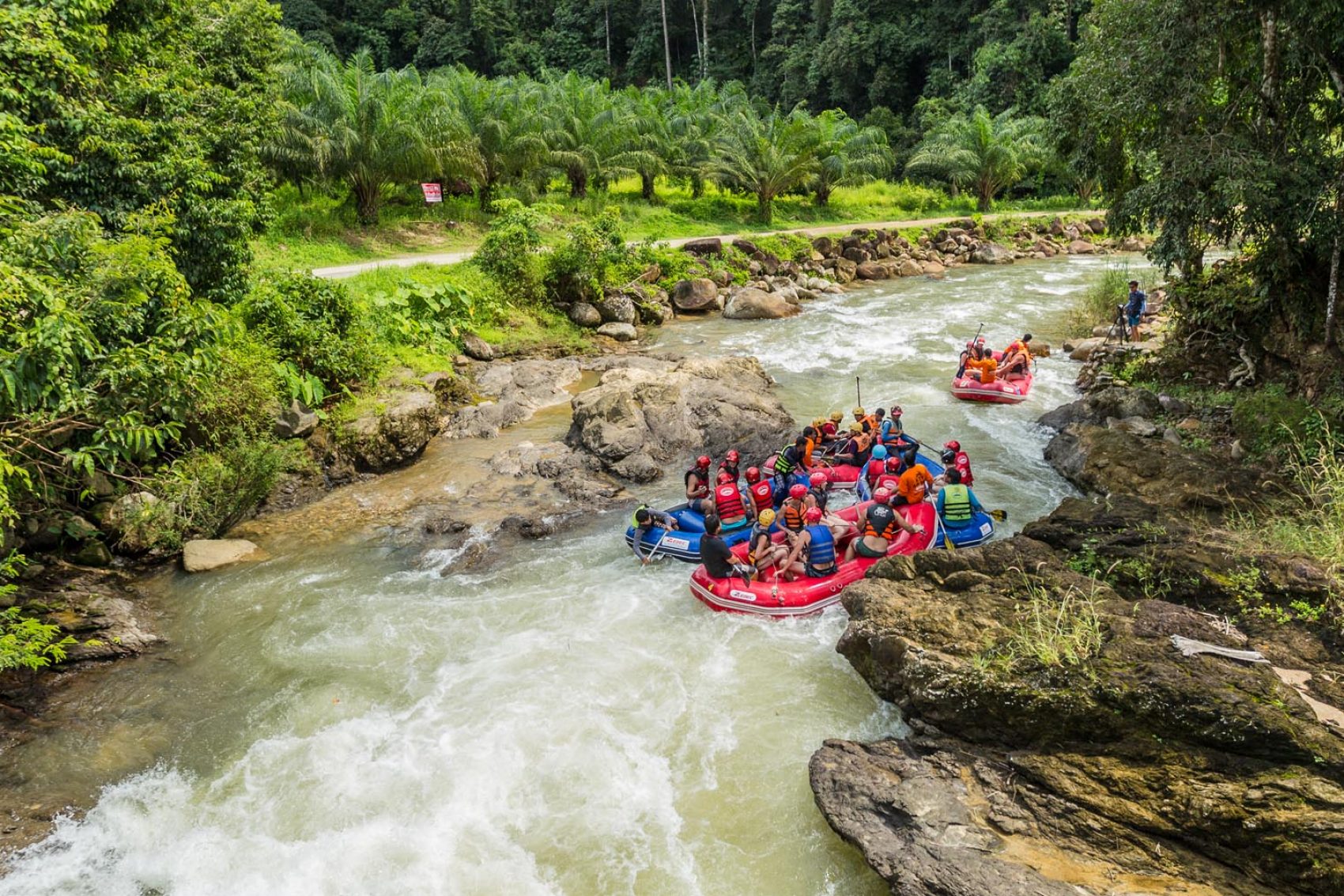 Tourists are rafting in a stream in a forest in Phuket