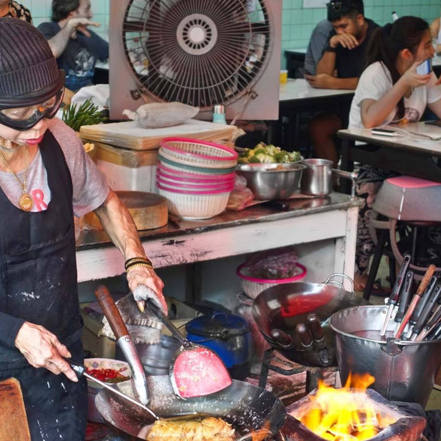 Jay Fai’s roadside restaurant - making a crab omelette. Credit: Shutterstock