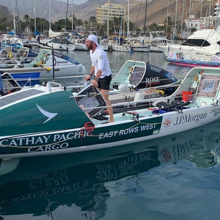 Cathay Pacific Cargo East Rows West boat in harbour