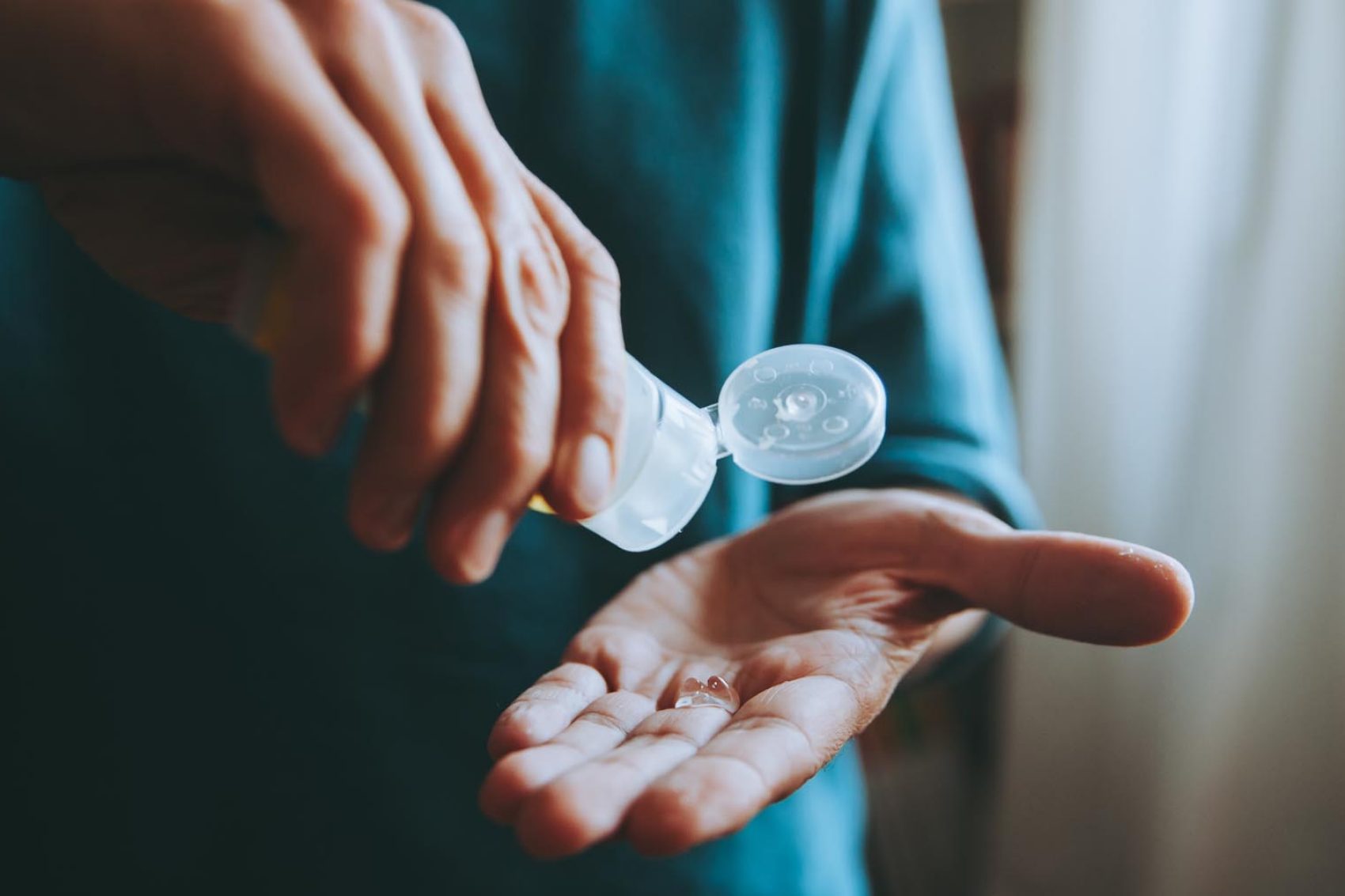 Person using hand sanitiser. Credit: iStock