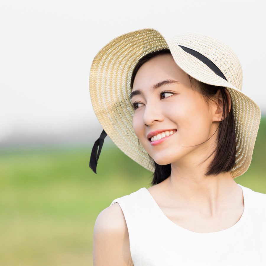 Woman wearing hat outside 