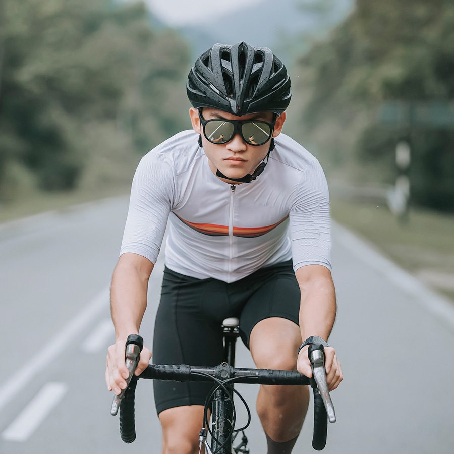 Man cycling on road