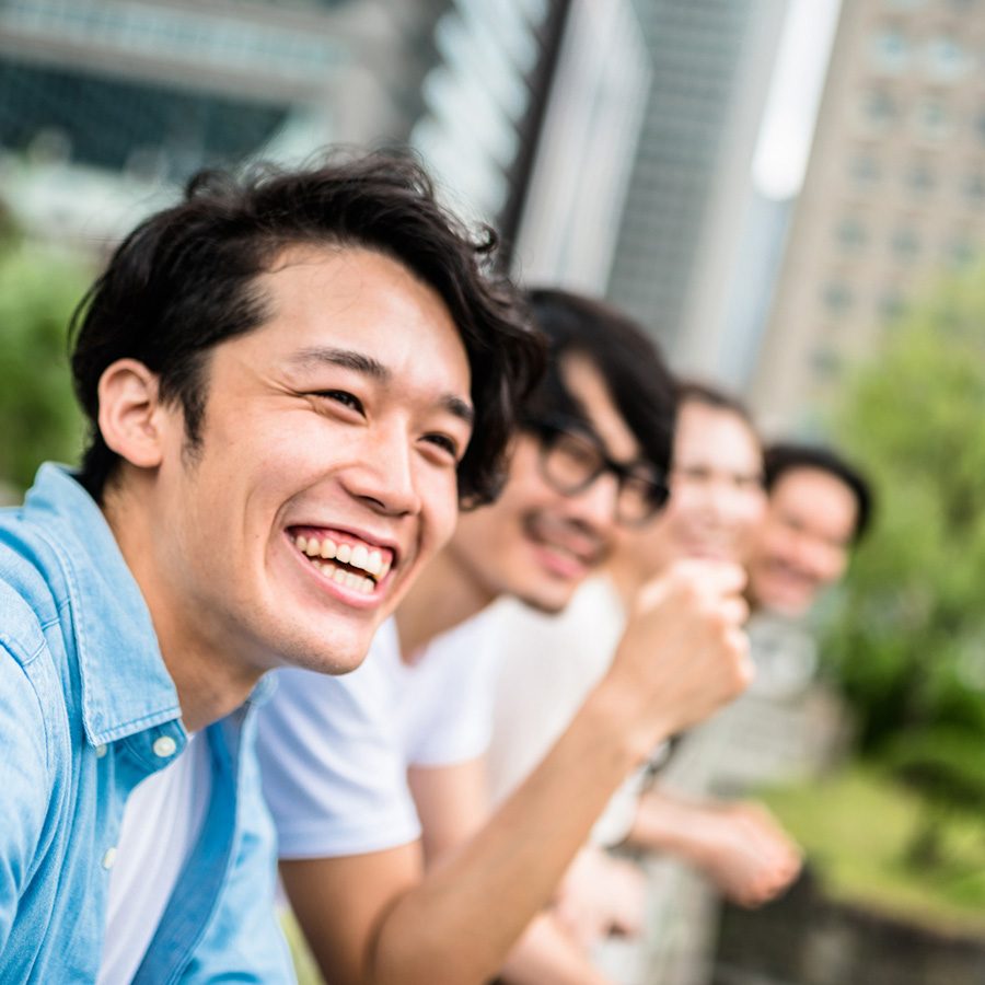 Group of men laughing together