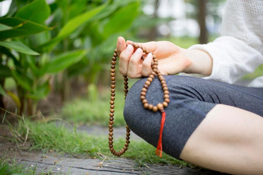 Hands holding beads. Credit: 123RF