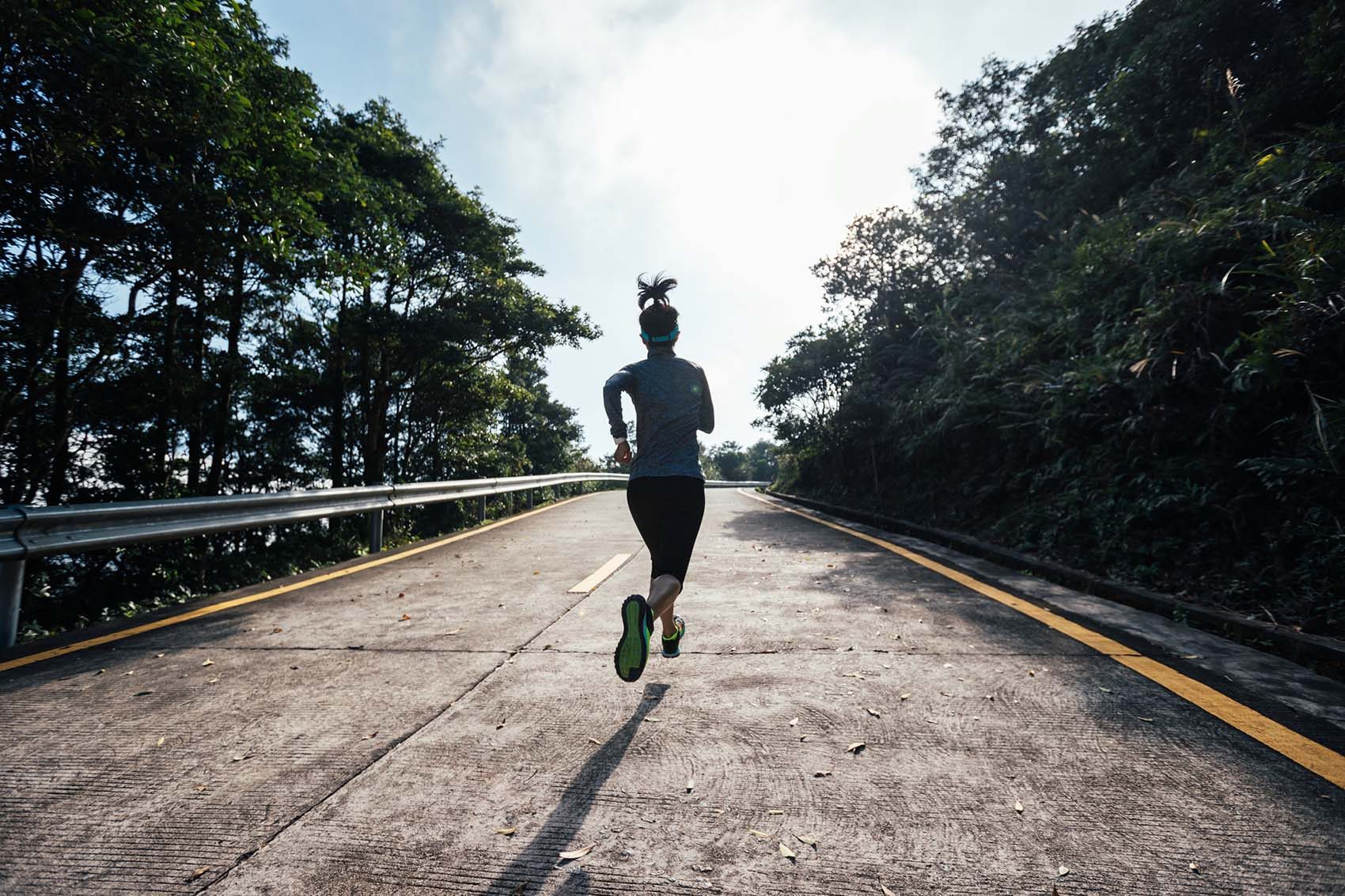 Person running on road. Credit: Getty Images