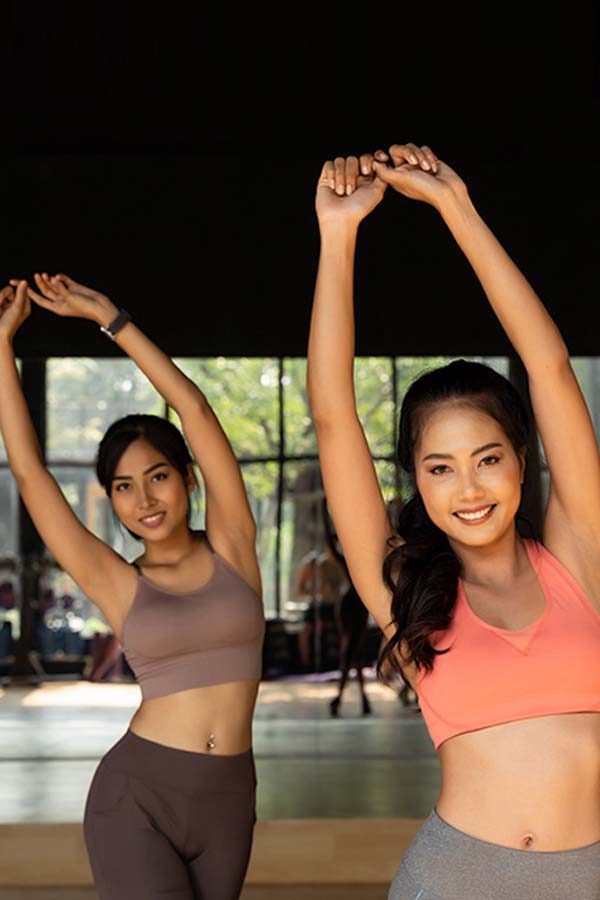 Women stretching in class