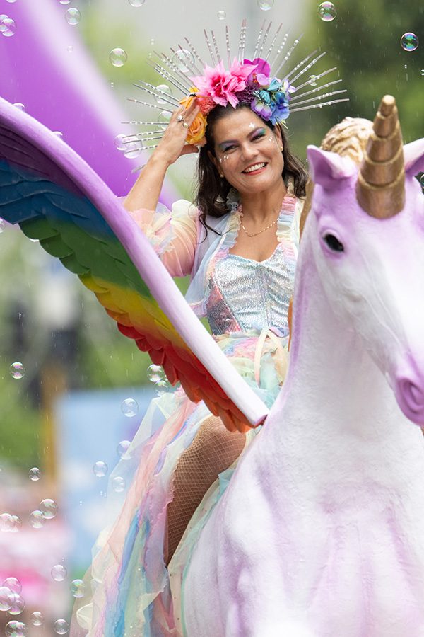 Fairy on unicorn in parade