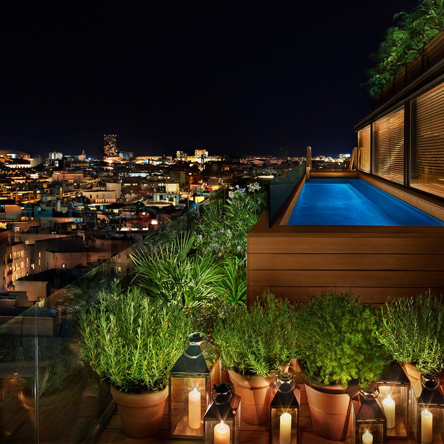 The Barcelona EDITION rooftop pool at night
