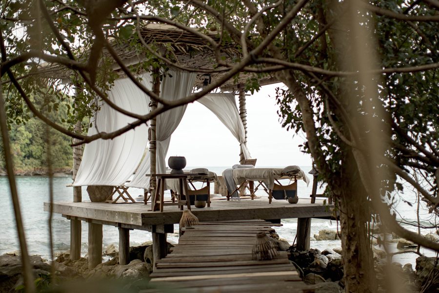 Decking with seats at end over water