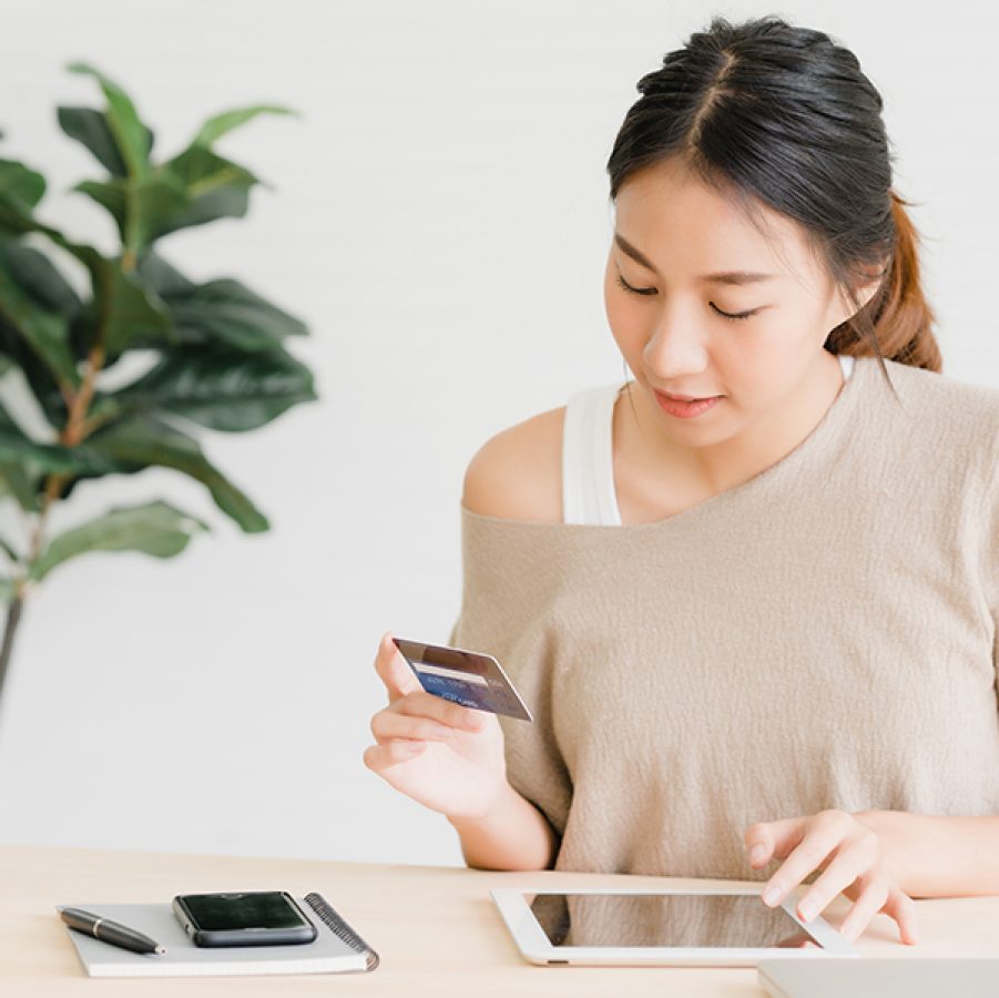 woman looks at phone