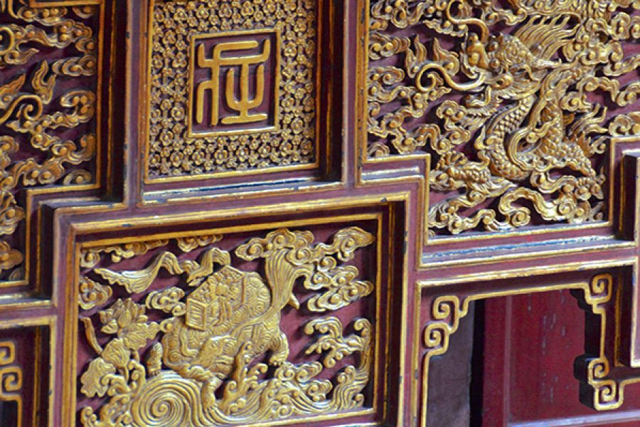 A piece of furniture depicting a golden dragon at the Temple of Literature in Hanoi. Credit: Getty Images