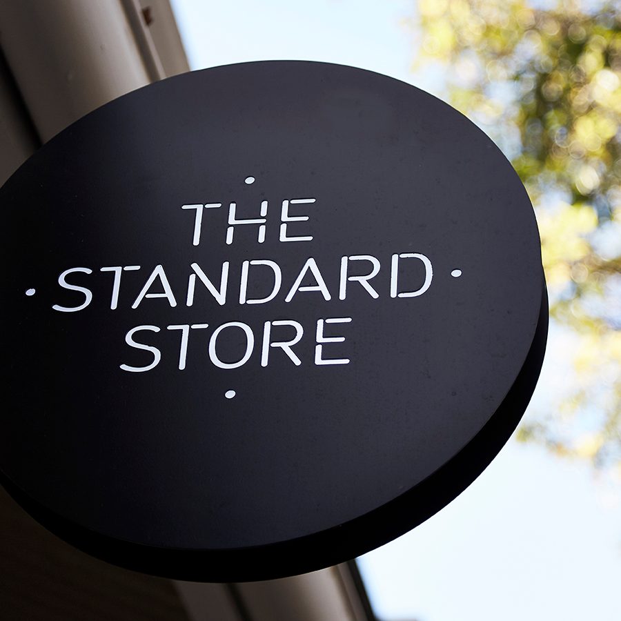 A close up of The Standard Store shop sign outside during daytime in Surry Hills, Sydney, Australia