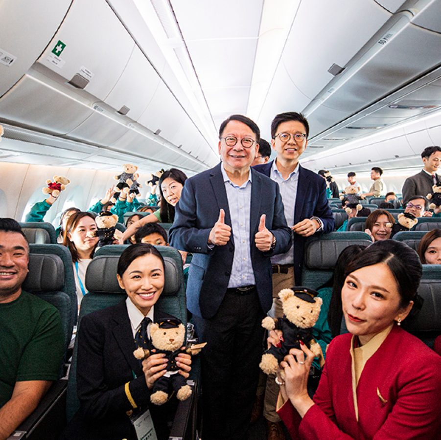 Passengers and members of the Cathay Pacific team on a Community Flight 