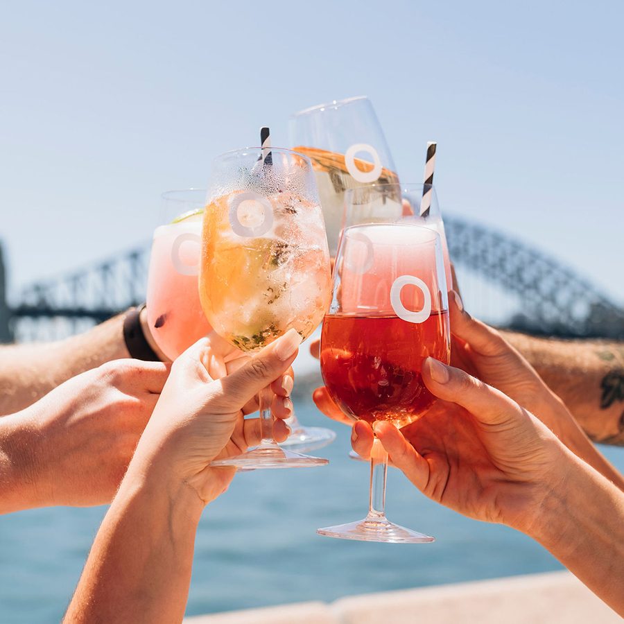 Friends having a drink in front of the harbour