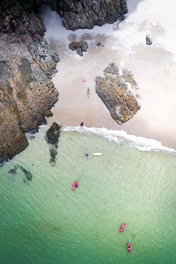 Kayaks in the ocean. Credit: Tugo Cheng