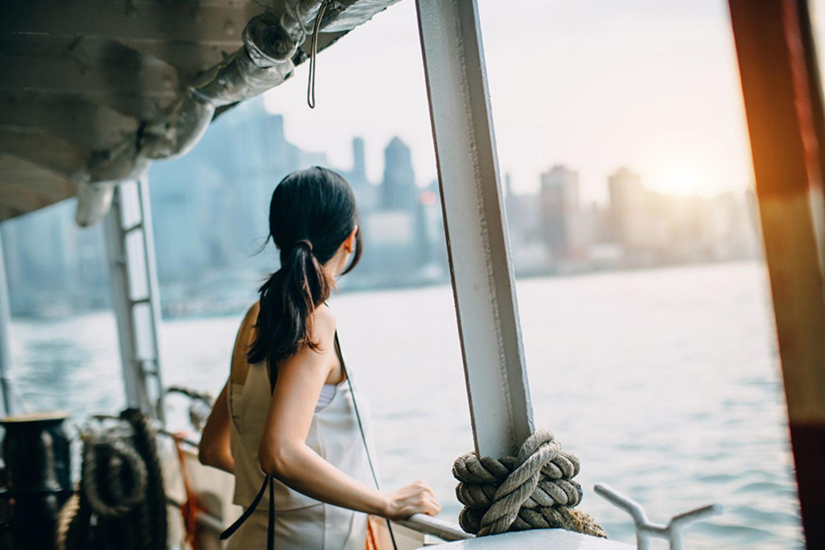 Woman on the star ferry. Credit: Tugo Cheng