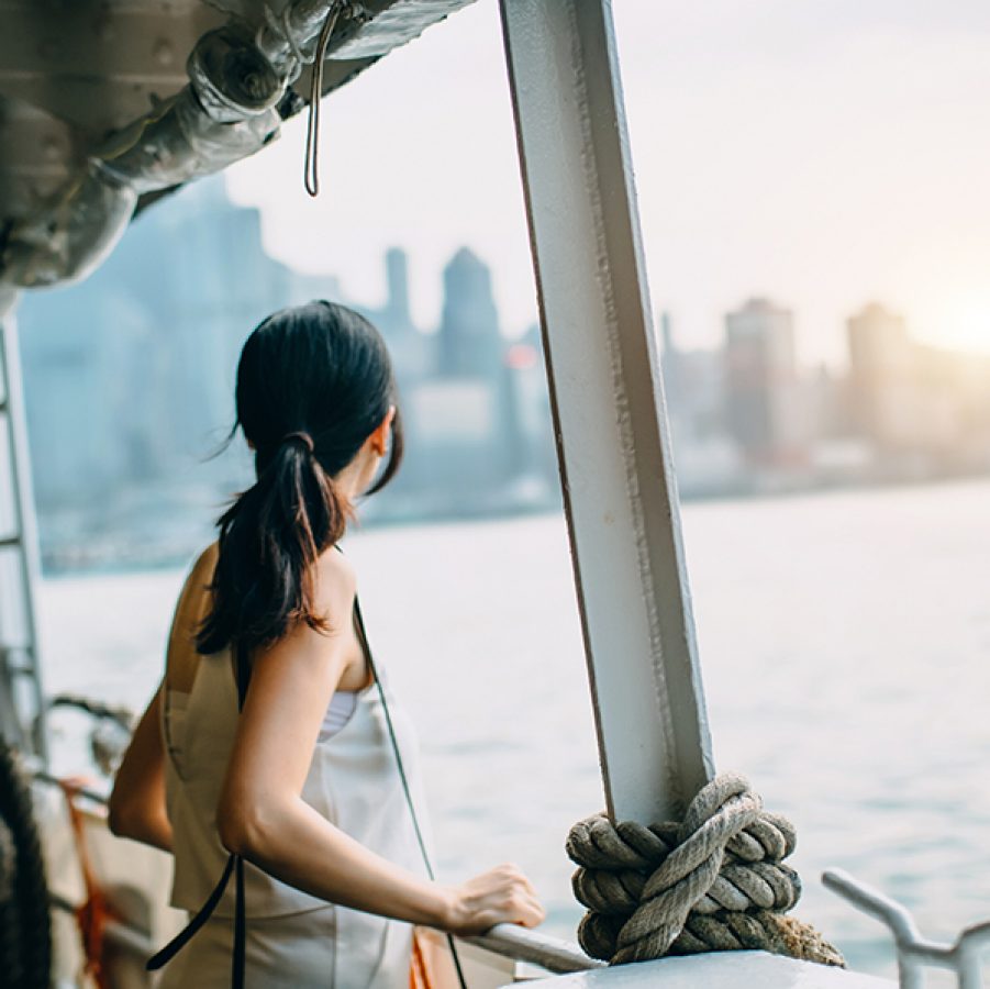 Woman on the star ferry. Credit: Tugo Cheng