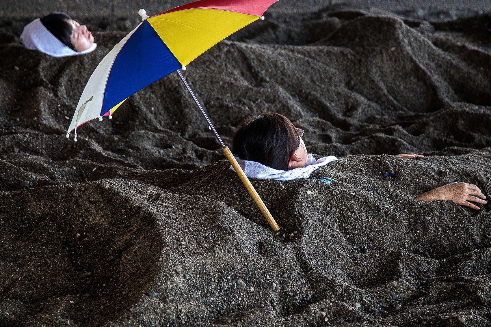 Bathing in hot sand in Japan
