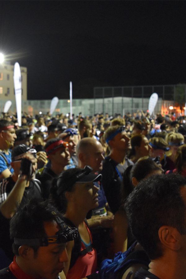 A crowd of runners prepare to race at Barclays MoonTrekker