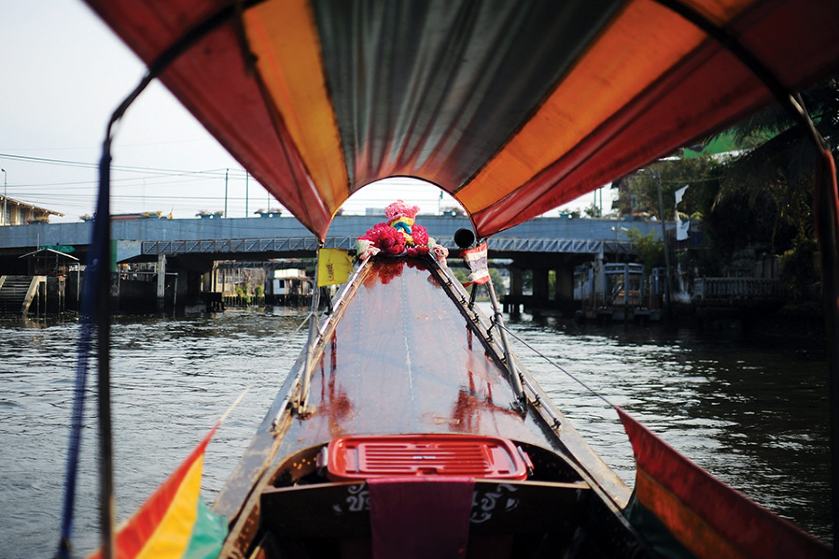 Speed on a long-tail through Bangkok’s canal. Credit: Getty Images