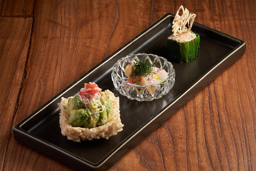 A tray with three dishes on it