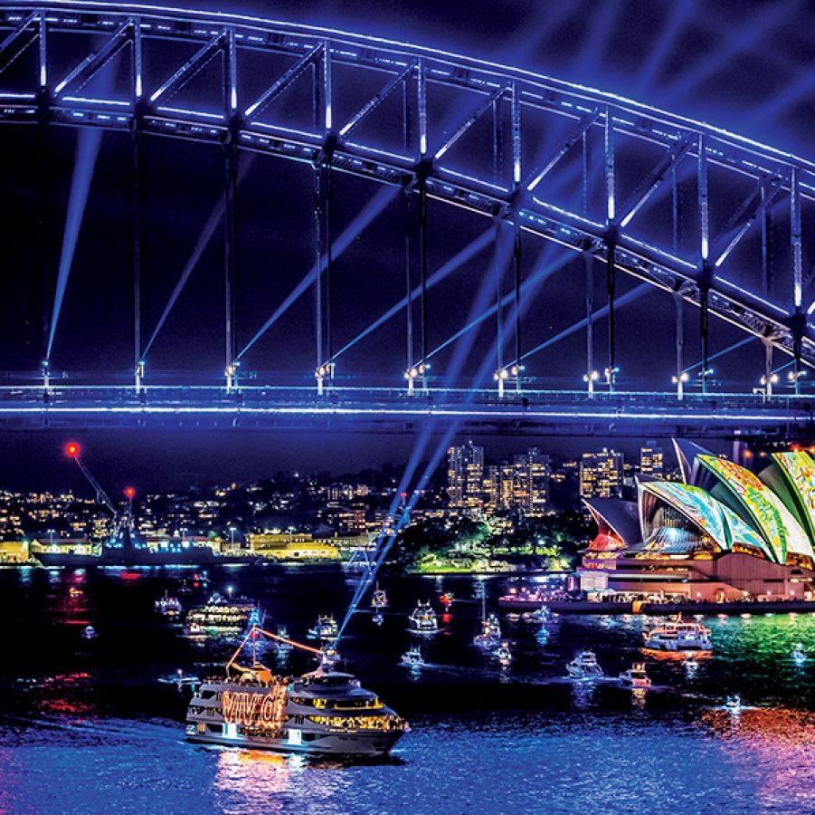 Vivid sydney festival. Sydney harbour bridge lit up at night.