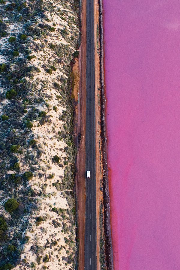Road next to pink sea, Western Australia
