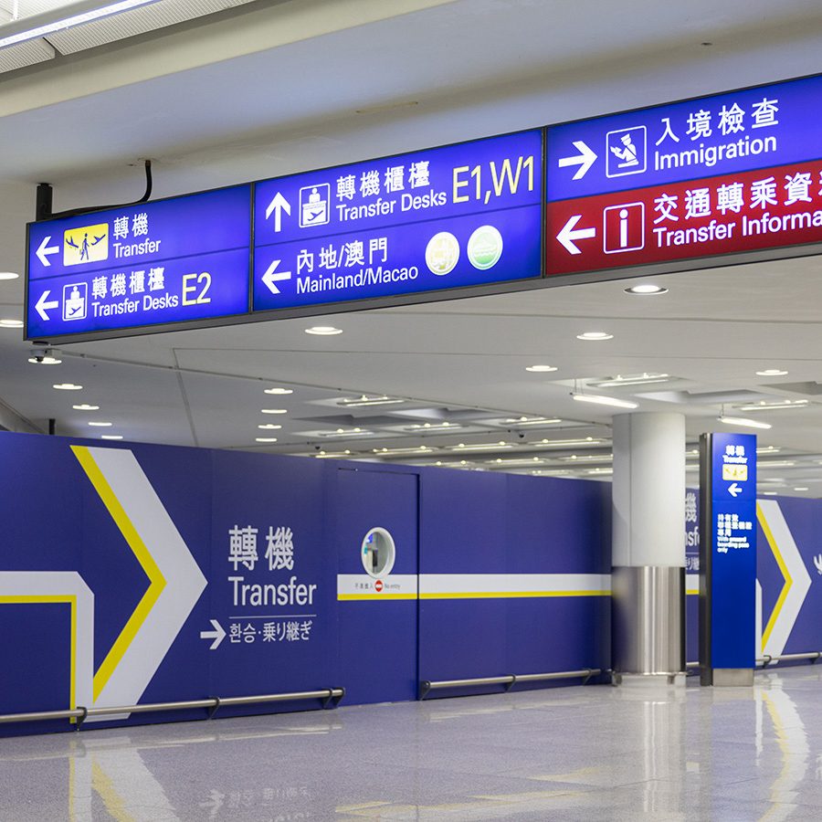 Airport signs to transfer desks in HKIA