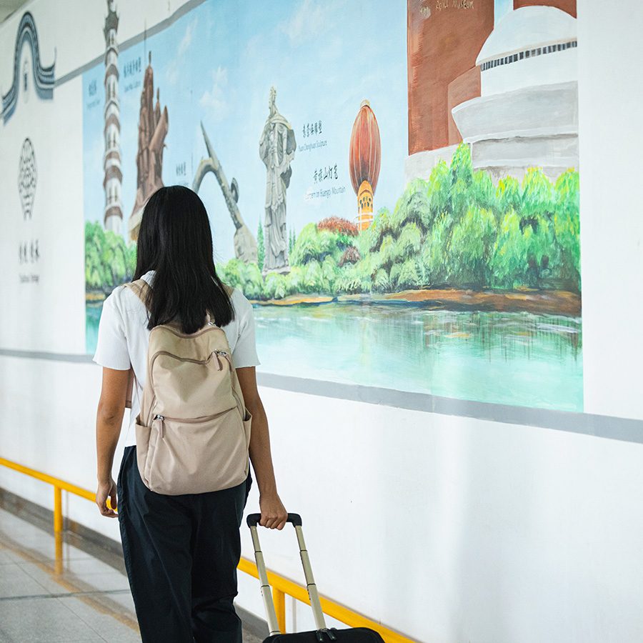 Woman leaving Humen airport ferry terminal