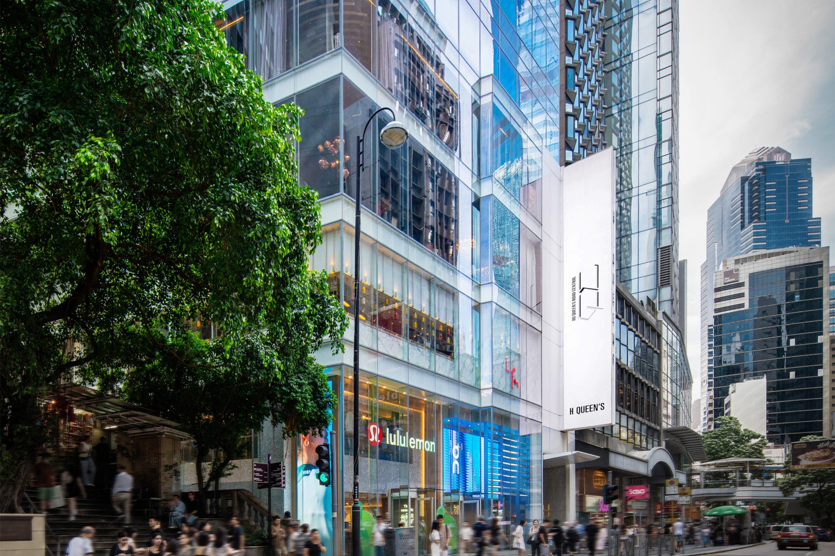 A street view of the exterior of the H Queen’s building