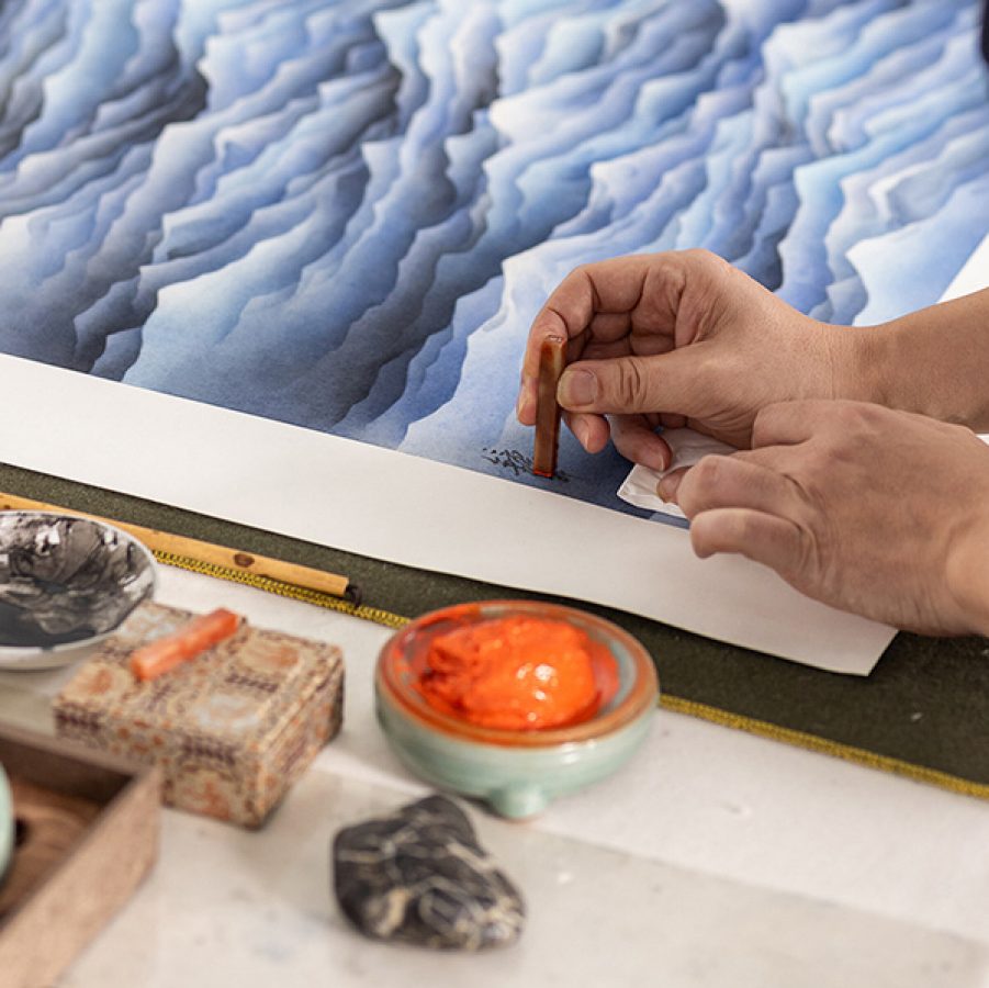 Close up of Chan Keng Tin's hands as he works on a piece for his Formless series
