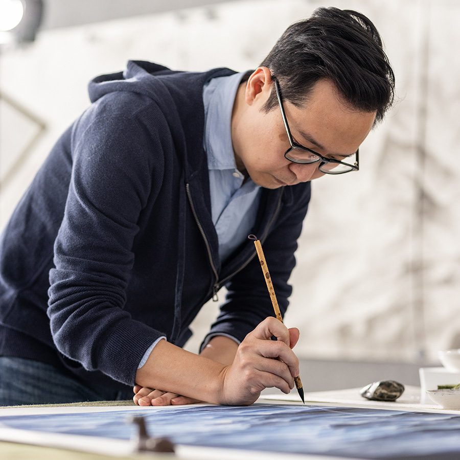 Artist Chan Keng Tin at work on one of his art pieces