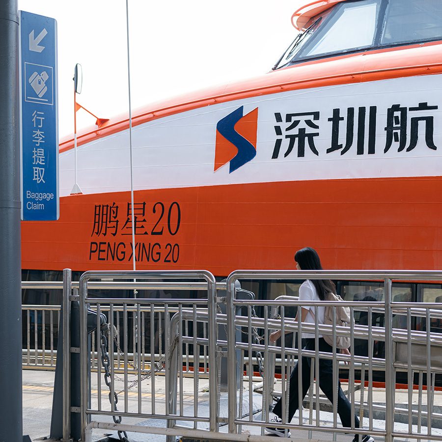 Woman disembarking the Shenzhen ferry