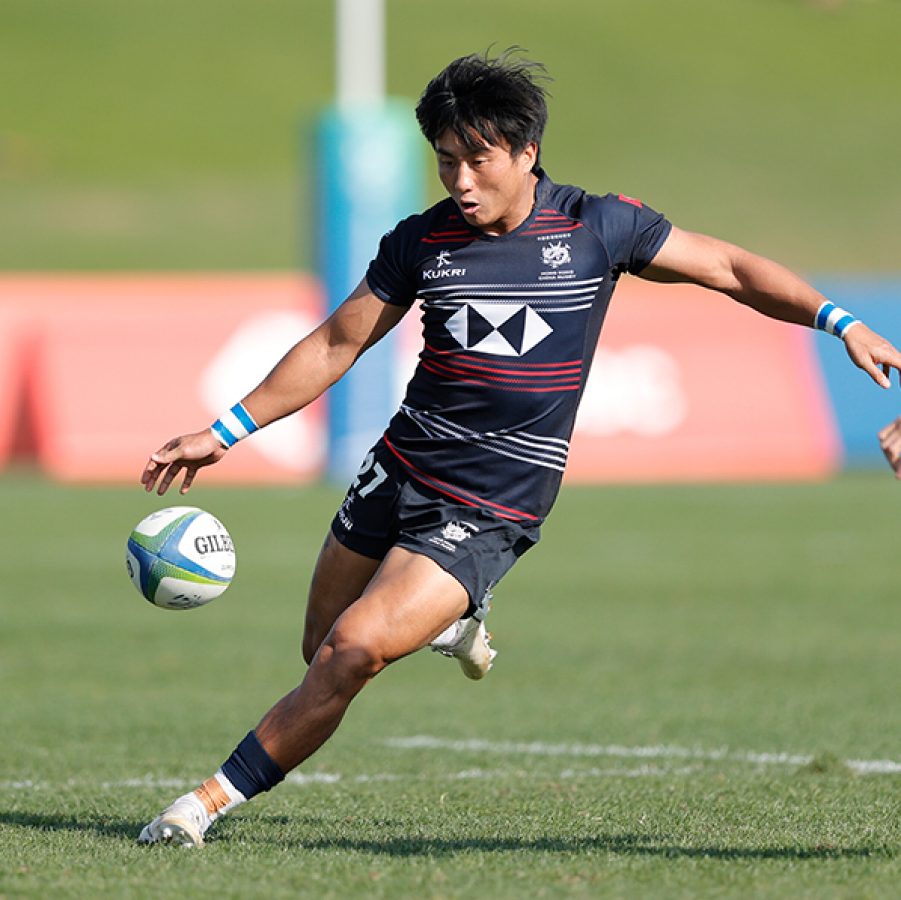 Cado Lee kicking a rugby ball