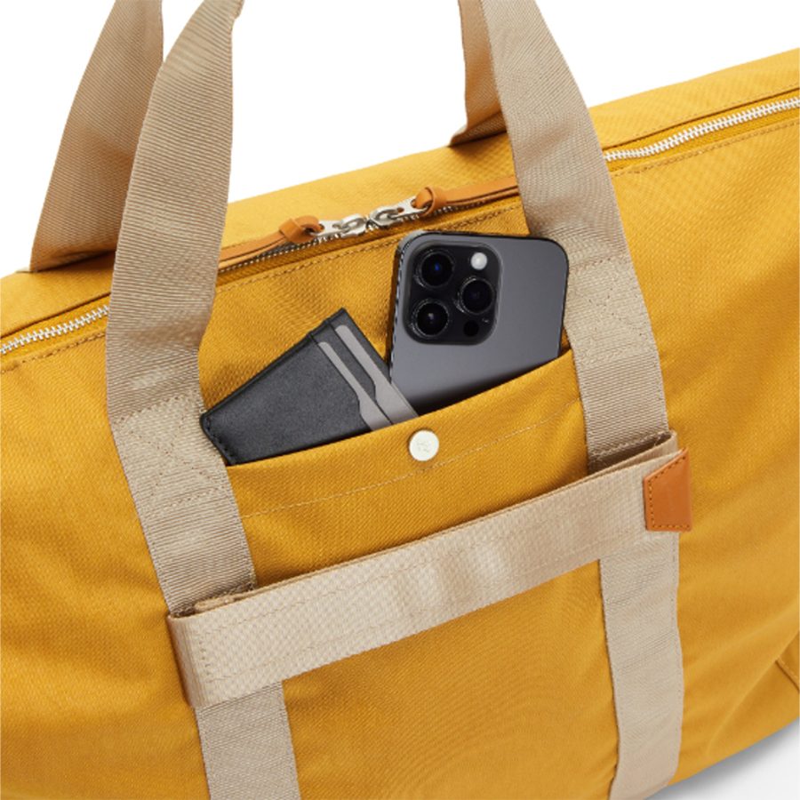 phone and cardholder inside pocket of Lojel’s Niru duffel bag
