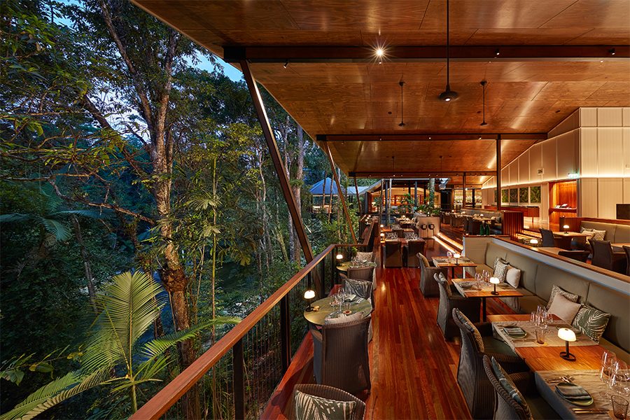 Elegant dining setup at the Treehouse Restaurant in Silky Oaks Lodge, Australia