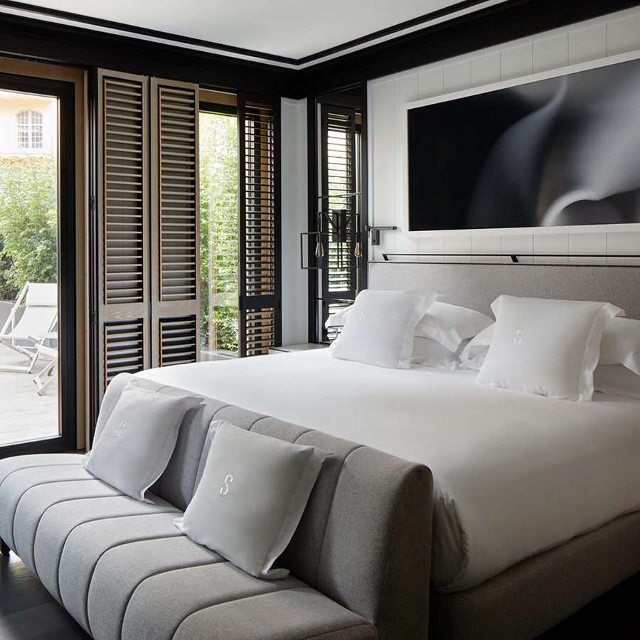 Seventy Barcelona guest room interior with bed and sofa