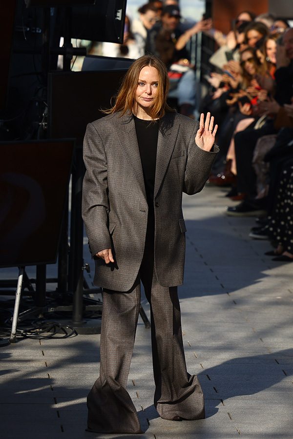 Stella McCartney greets guests on the runway