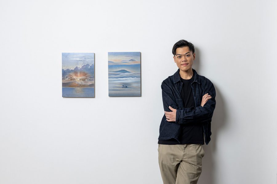 Gallery in the skies artist Lau Yin Yeung with his two pictures