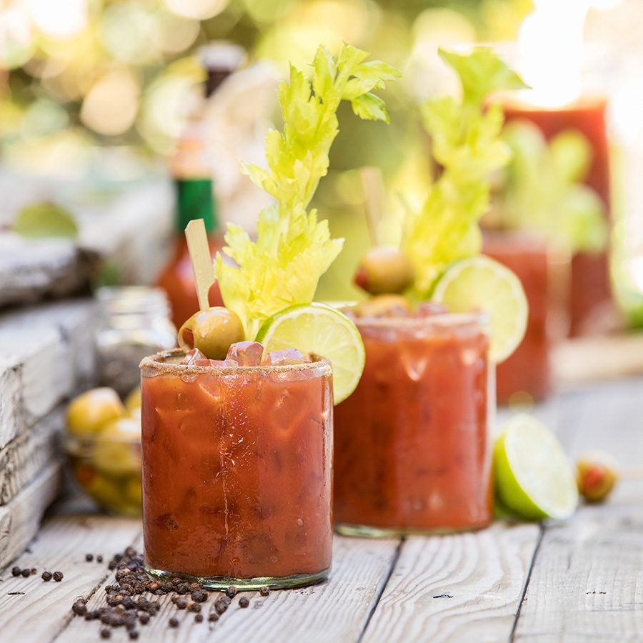 Two red coctails with lime 