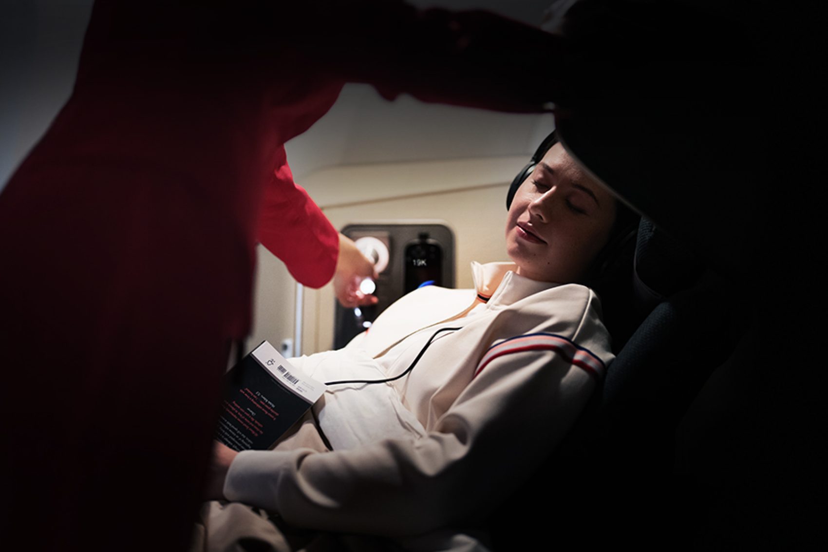 Siobhan Haughey resting on a Cathay plane