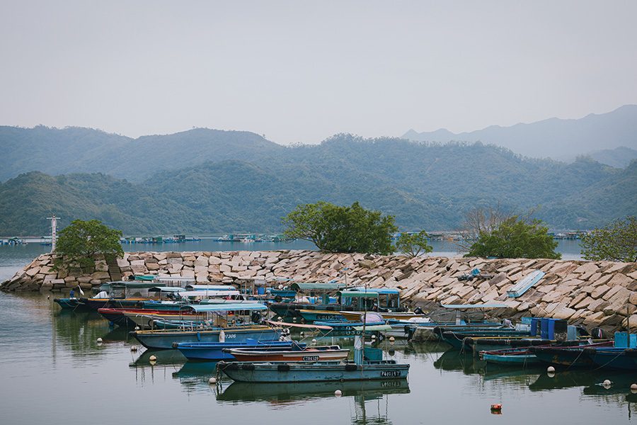 Boats parked by the seashore in Sha Tau Kok
