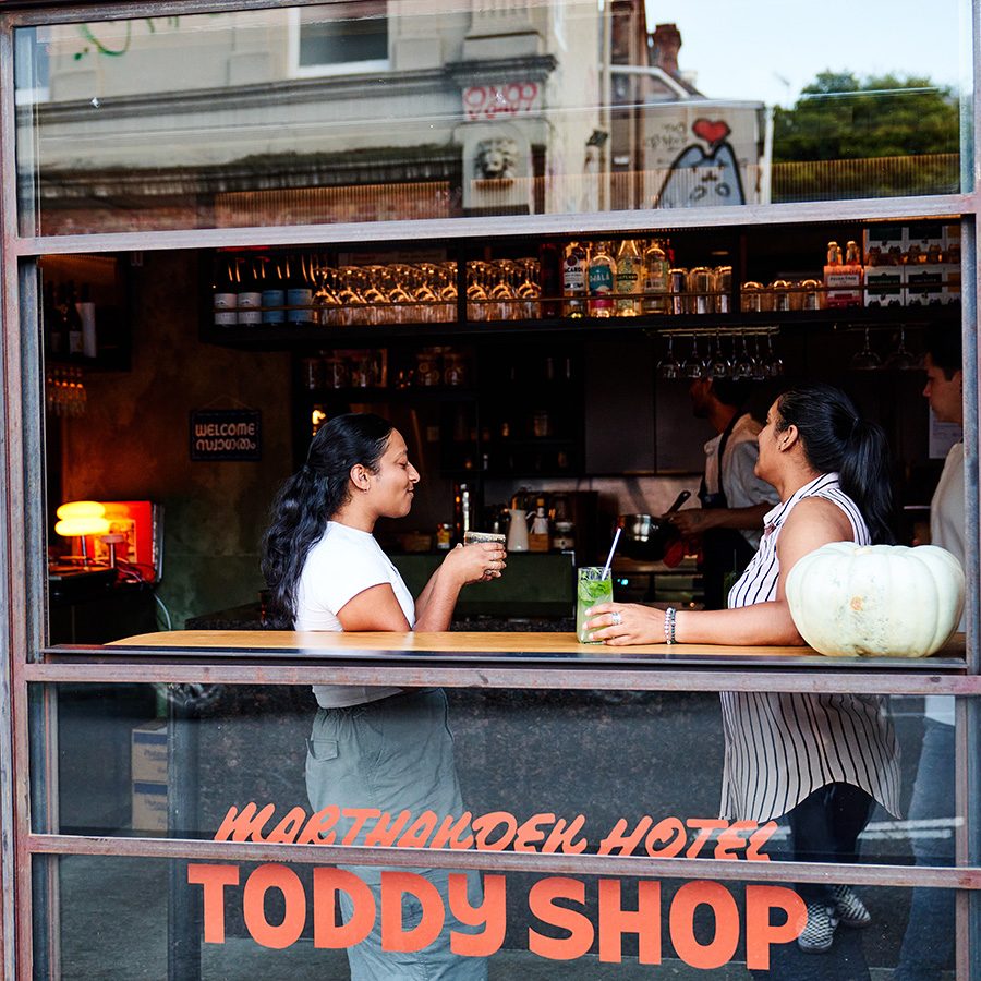 Two women dining at Toddy Shop