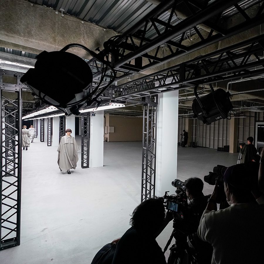 Photographers are shooting the runway during the HYKE 2020 fashion showy in Tokyo