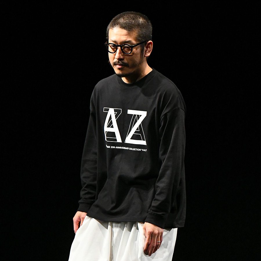 A portrait of Japanese fashion designer Kunihiko Morinaga