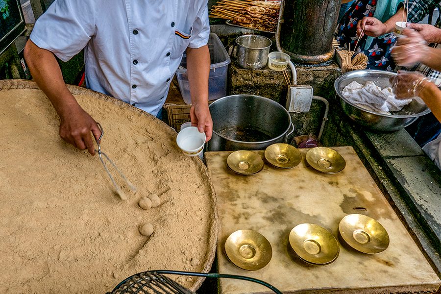 A local sweet snack in Chengdu called San Da Pao (Three Big Cannons) 