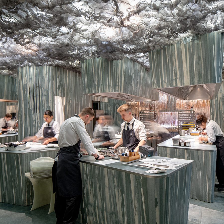 Silver kitchen with chefs