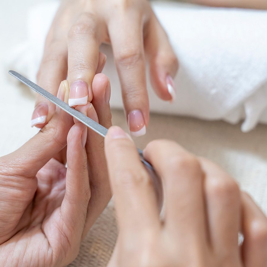 A person getting a manicure