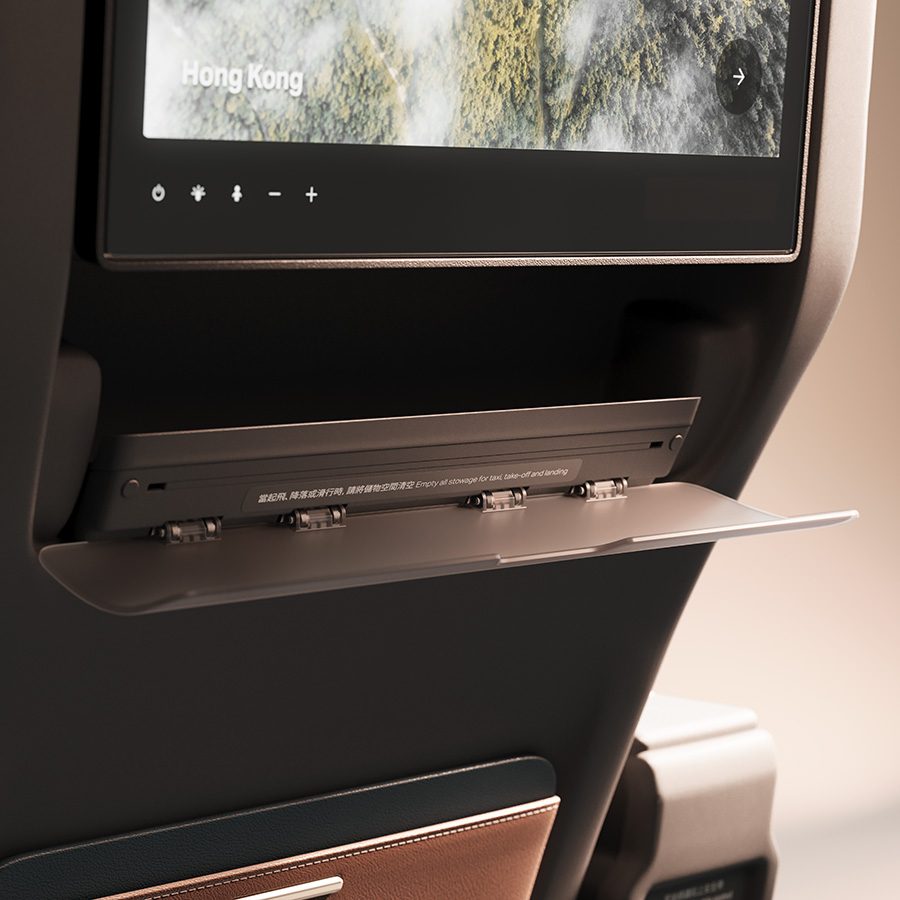 Cathay Pacific Premium Economy seat modern tray